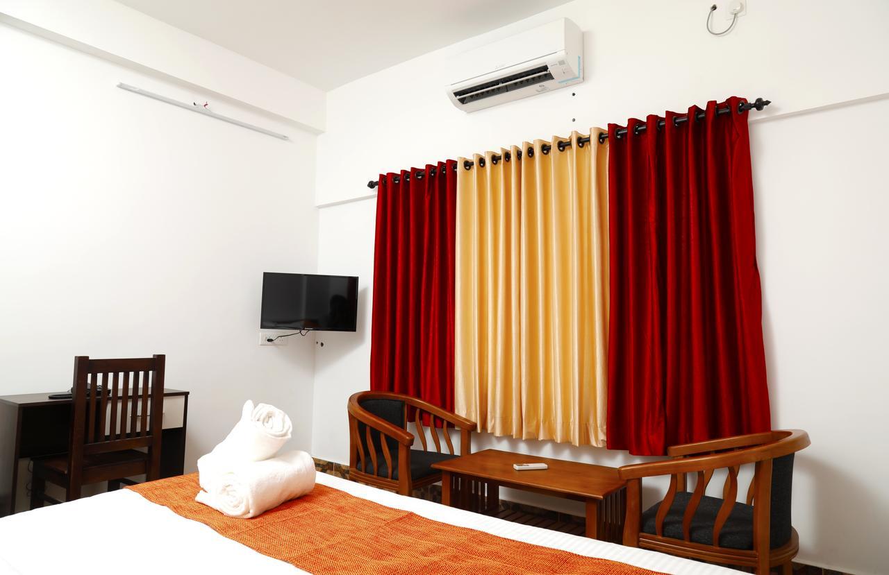 Puthens Clifton Inn Kottayam Dış mekan fotoğraf