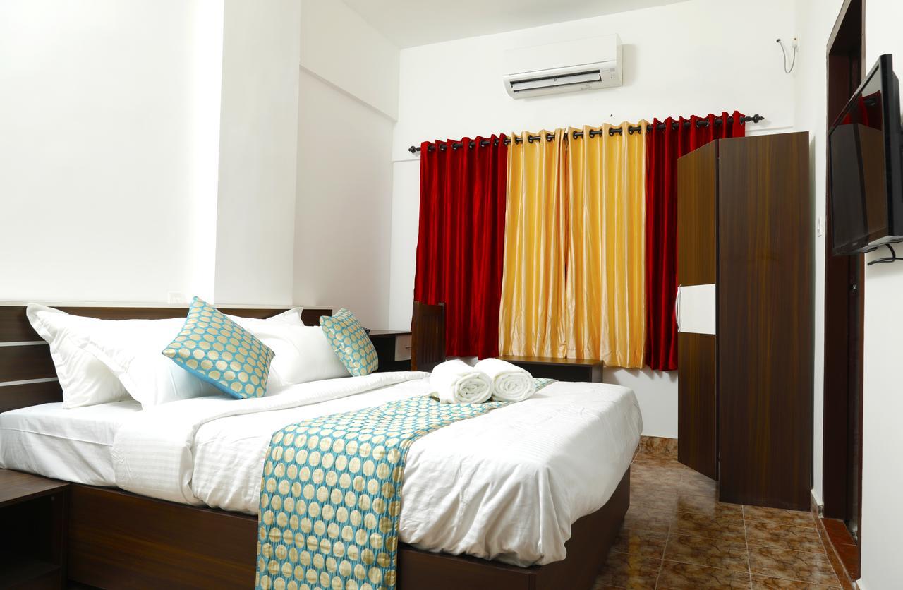 Puthens Clifton Inn Kottayam Dış mekan fotoğraf