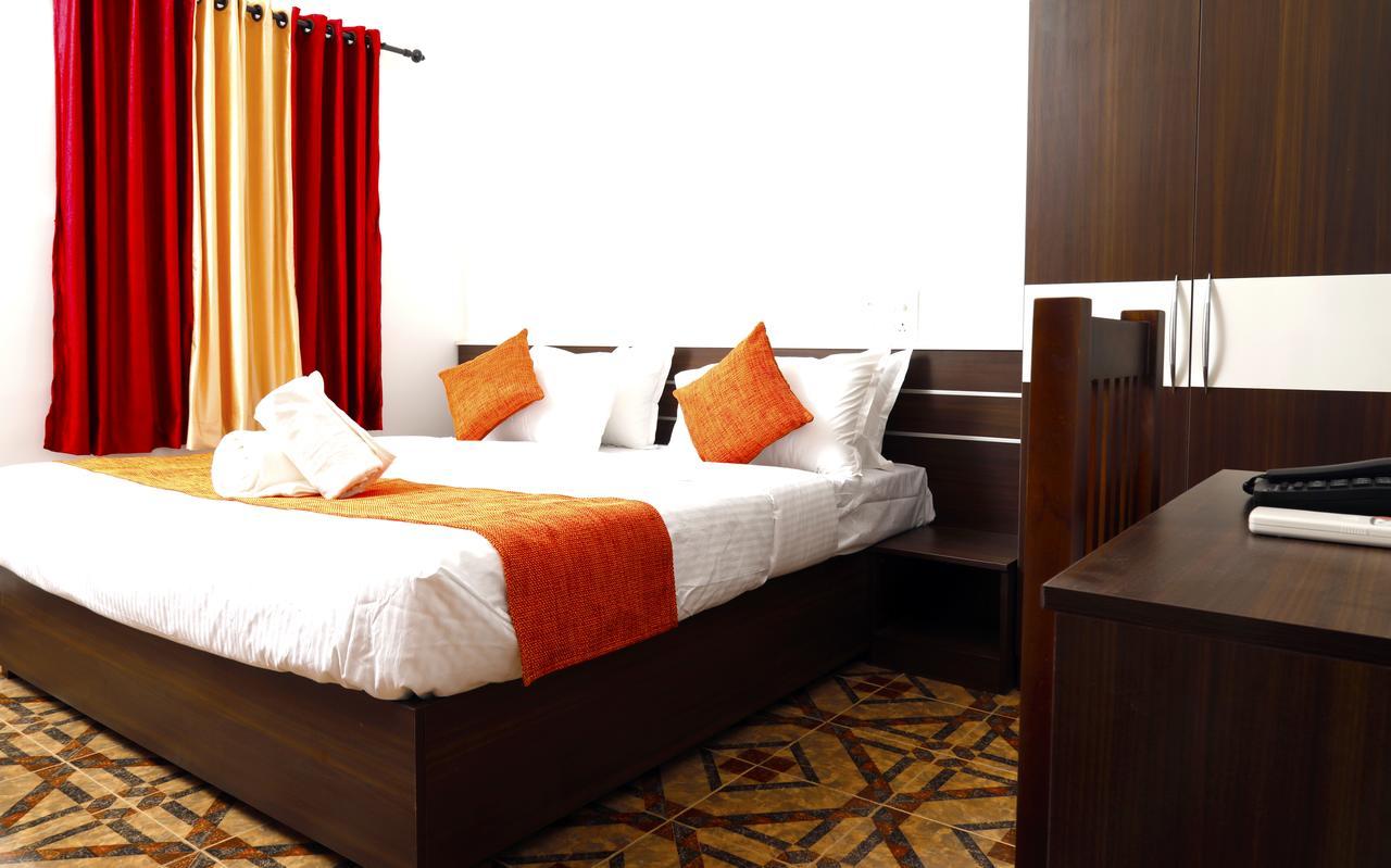 Puthens Clifton Inn Kottayam Dış mekan fotoğraf