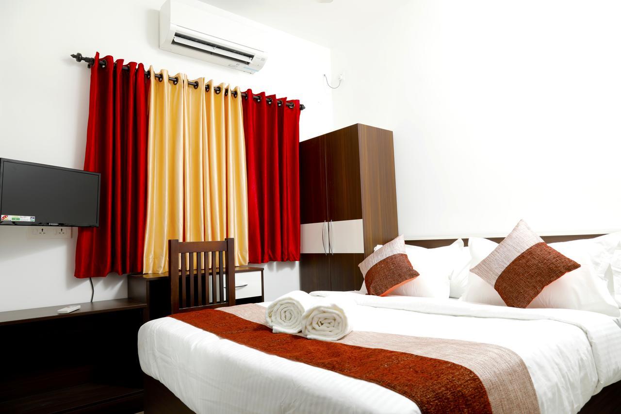 Puthens Clifton Inn Kottayam Dış mekan fotoğraf