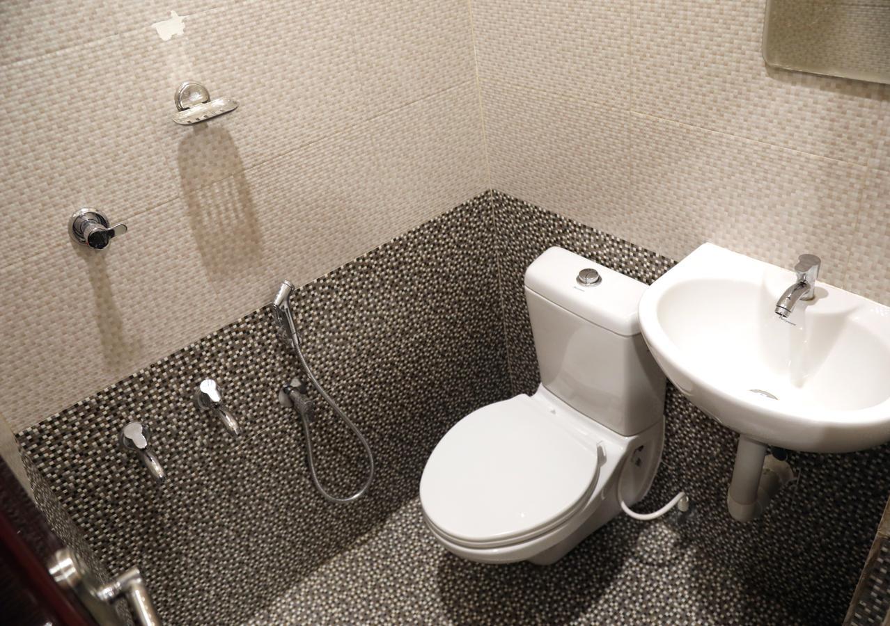 Puthens Clifton Inn Kottayam Dış mekan fotoğraf