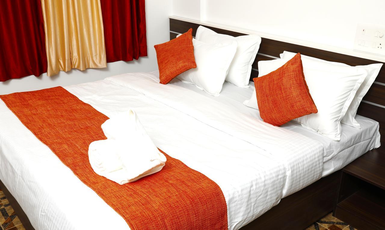 Puthens Clifton Inn Kottayam Dış mekan fotoğraf