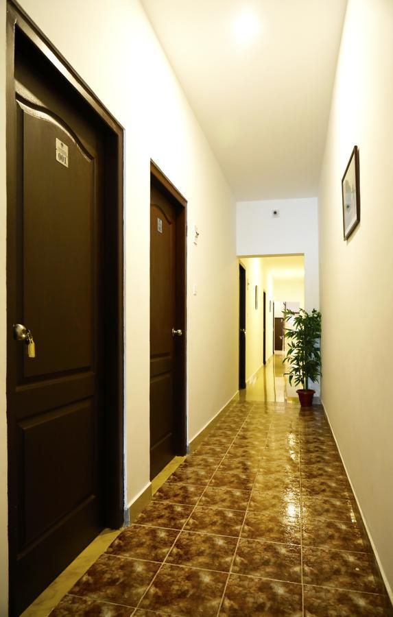 Puthens Clifton Inn Kottayam Dış mekan fotoğraf