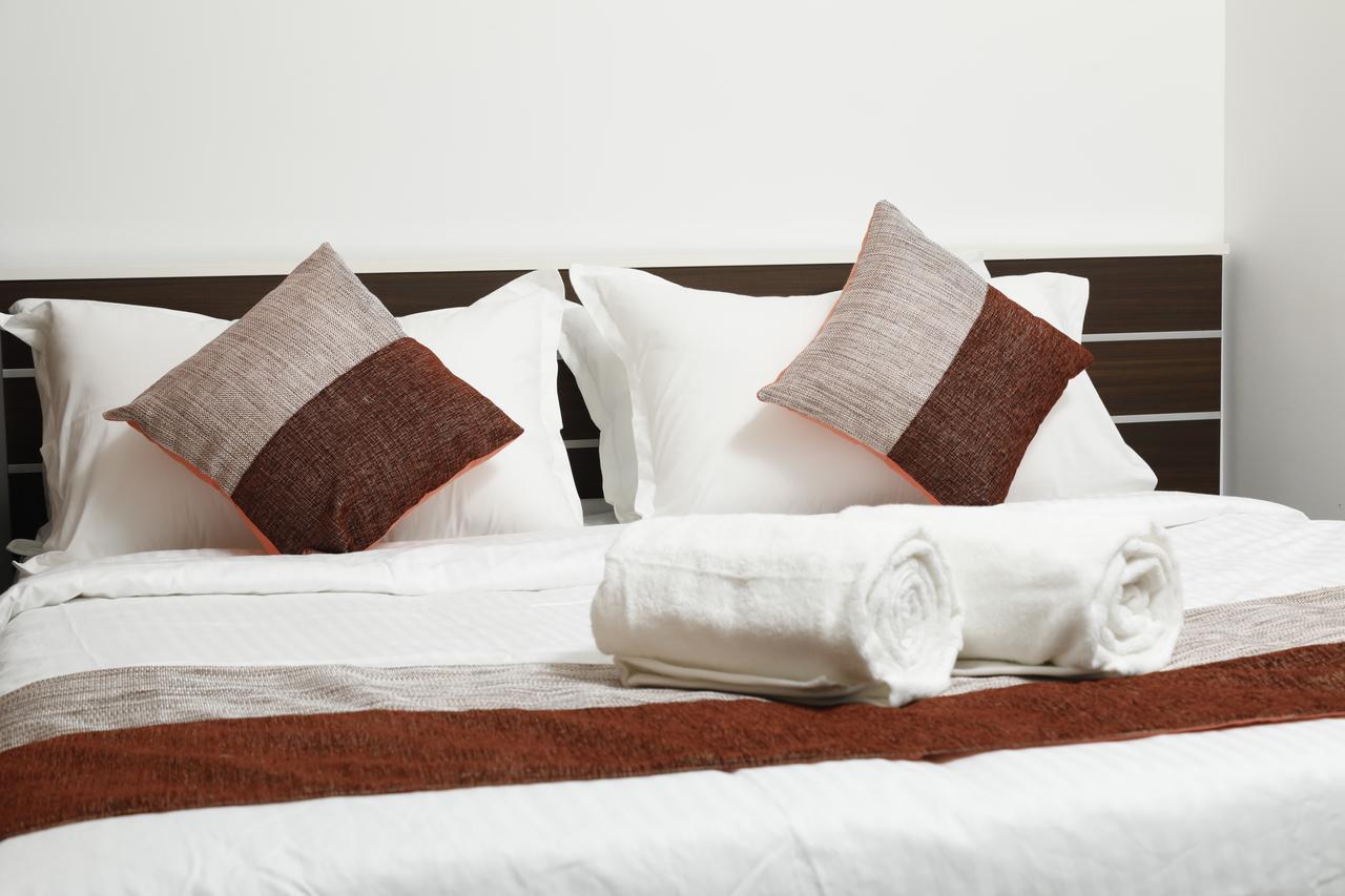 Puthens Clifton Inn Kottayam Dış mekan fotoğraf