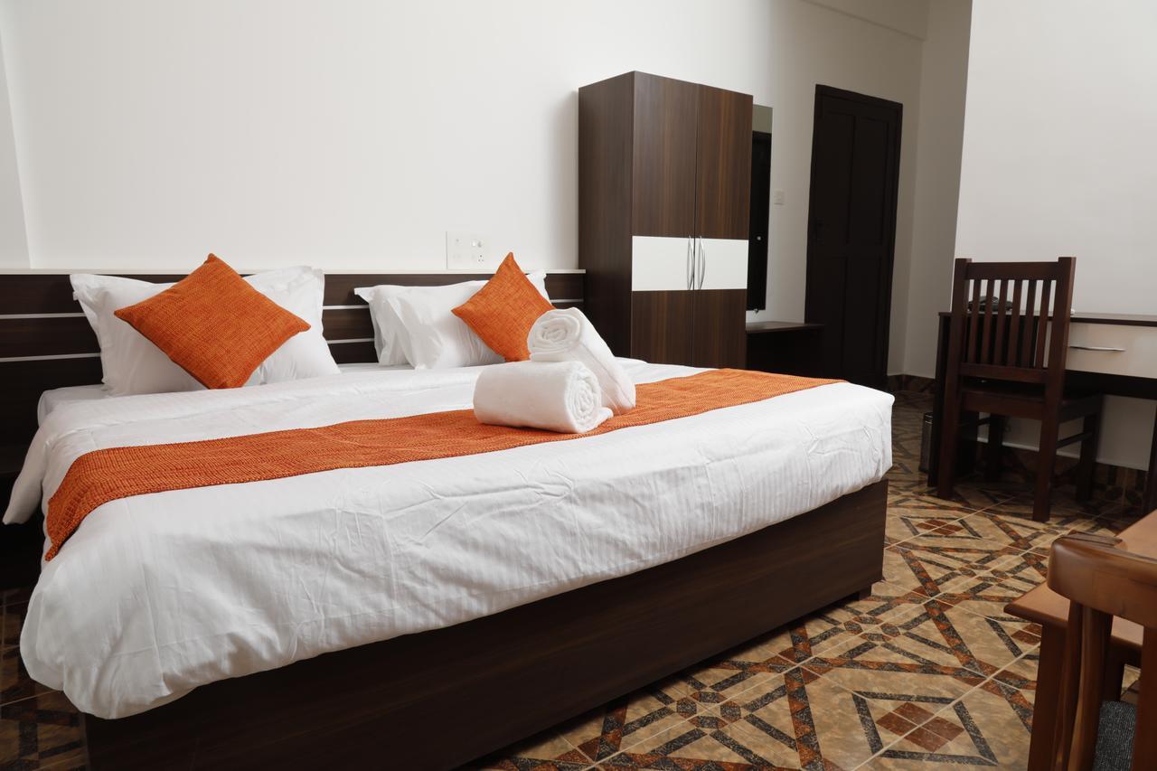 Puthens Clifton Inn Kottayam Dış mekan fotoğraf