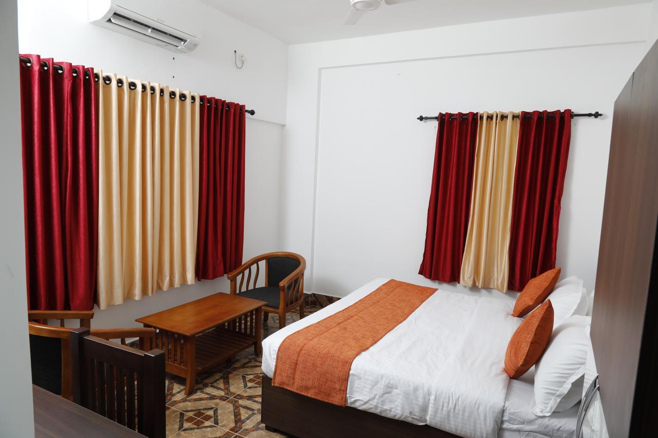 Puthens Clifton Inn Kottayam Dış mekan fotoğraf