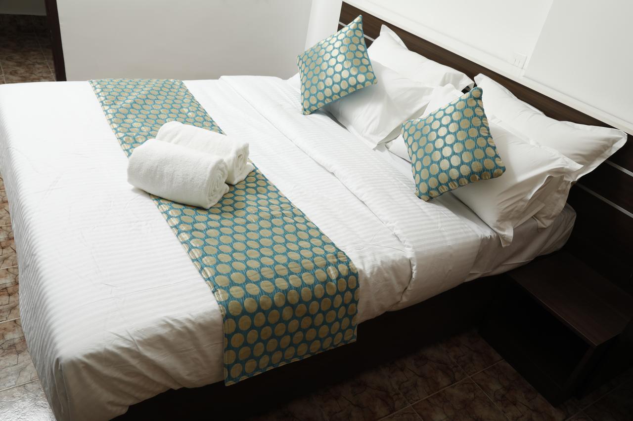 Puthens Clifton Inn Kottayam Dış mekan fotoğraf